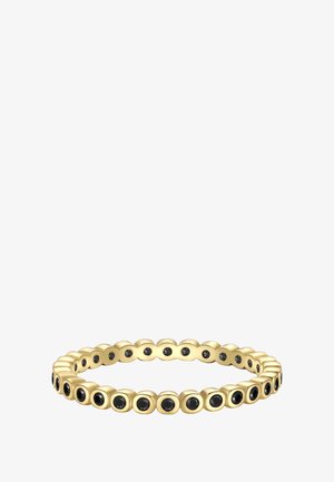 Anello d'oro con pietre nere tonde disposte uniformemente in piccoli bezels quadrati lungo tutto il giro.