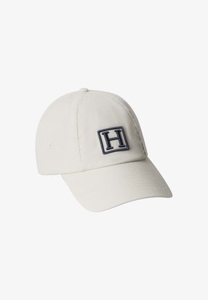 Cappellino da baseball bianco con visiera curva, con una "H" nera ricamata all'interno di un quadrato sul pannello frontale.