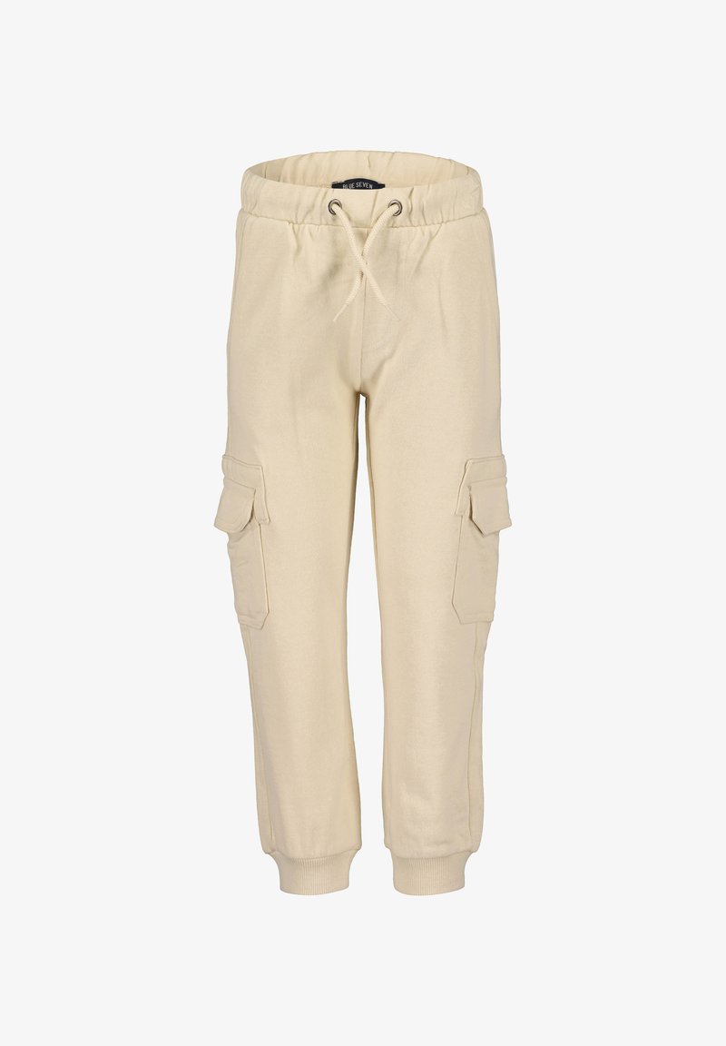 Pantalons de survêtement beiges en tissu doux, dotés d'une taille élastique avec cordon de serrage, de poignets côtelés et de deux poches cargo sur les côtés.