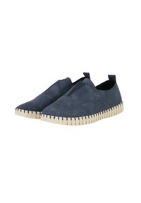 Ballerines bleu marine avec un dessus lisse, des inserts élastiques et une semelle en caoutchouc crème texturée avec un motif en zigzag.