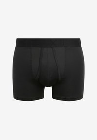 Boxer-culotte noire en tissu lisse, dotée d'une ceinture élastique avec logo en relief et d'un design de poche avant pour un soutien optimal.