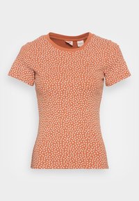 Krátký rukáv, přiléhavé oran�žové bavlněné tričko s bílým květinovým potiskem. Kolo výstřih a měkká textura, s malým logem na hrudi.