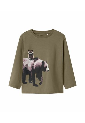 Olive green long-sleeve shirt featuring a graphic print of a bear with a raccoon on top, made of soft cotton material. Crew neckline.