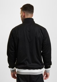 UNFAIR ATHLETICS Sweatjakke - black