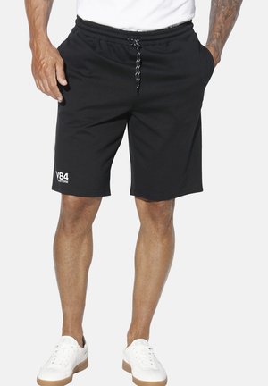 Schwarze Baumwollshorts mit elastischem Bund und Kordelzug. Mit seitlichen Taschen und einem weißen Logo am linken Bein.