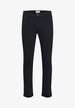 Pantaloni neri slim-fit realizzati in tessuto di cotone elasticizzato, con zip frontale, chiusura con bottone e orlo arrotolato.