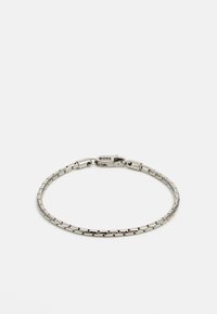 Silver metal bracelet with a linked design, featuring a clasp with the "BOSS" logo. Smooth texture and minimalistic style.