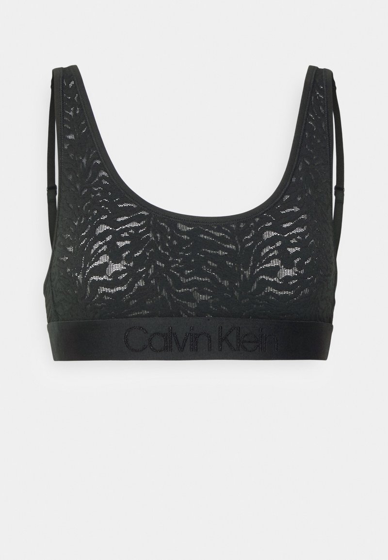 Černá krajková braletka s květinovým vzorem, výstřihem ve tvaru lodička, tenkými ramínky a pevným pasem s embosovaným nápisem "Calvin Klein" v černé barvě.