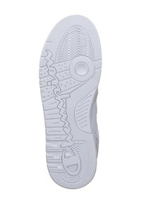 Weiße Sneaker-Sohle aus strukturiertem Gummi, mit einem kreisförmigen Akzent und Zickzack-Designelementen. Das Profilmuster sorgt für guten Halt.