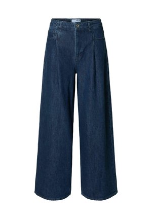 Pantaloni in denim blu scuro a gamba larga con vita alta, tasche frontali e chiusura con bottone standard. Tessuto strutturato e robusto.