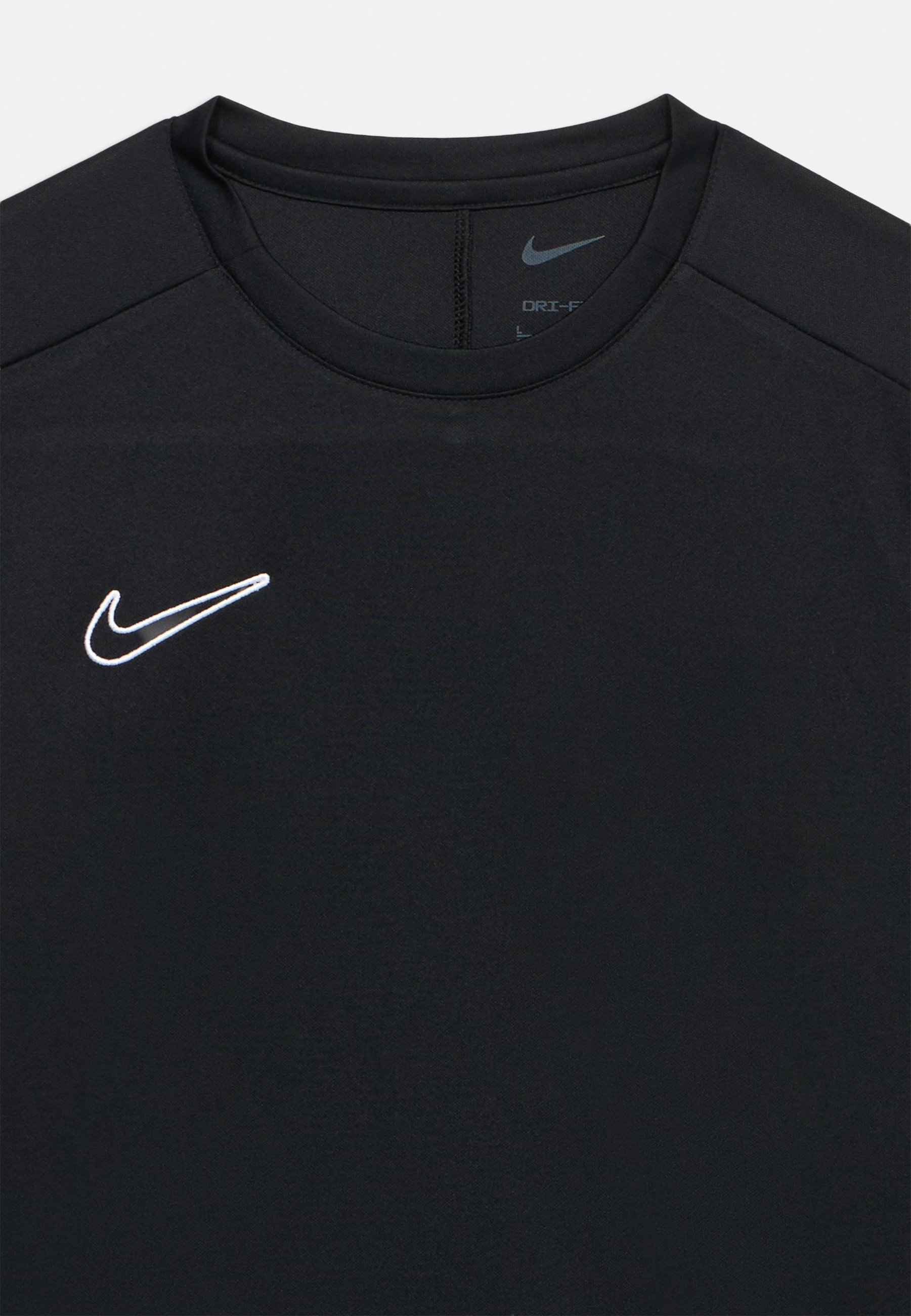 mens white and black nike shirt