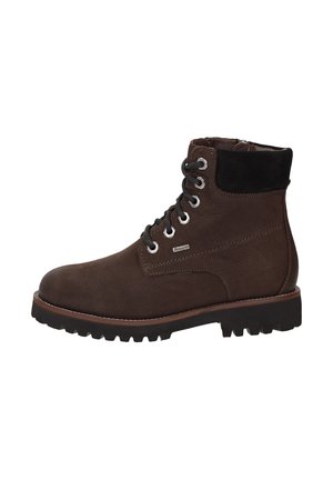 Stivaletti in pelle marrone con accenti in suede neri, punta rotonda, occhielli in metallo e lacci. Suola in gomma con battistrada per una migliore aderenza.