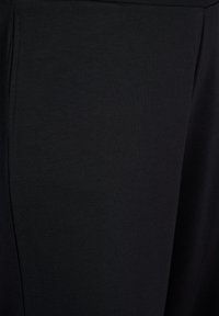 Zizzi 7/8- AUS MIX MIT TASCHEN - Jogginghose - black