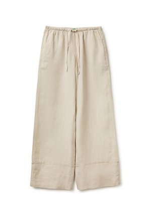 Beigefarbene Hosen mit weitem Bein, elastischem Bund und Kordelzug, mit seitlichen Taschen und einem abgesteppten Saum.