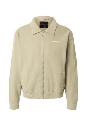 Beżowa kurtka sztruksowa na zamek błyskawiczny z kołnierzem, elastycznymi ściągaczami, bocznymi kieszeniami oraz białym logo "PEGADOR" na piersi.