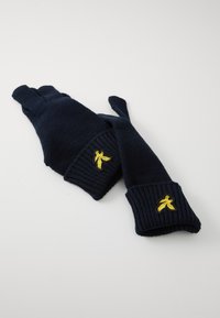 Mørkeblå strikkede fingerløse vanter med ribbede mansjetter og gult brodert bananlogo. Har åpninger for tommel og pekefinger.