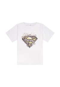 Weißes Baumwoll-T-Shirt mit einem großen schwarzen und goldenen Superman-Logo auf der Vorderseite, mit grafischen Elementen im Comic-Stil und Textdetails.