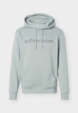 Lichtgrijze hoodie met voorzak, verstelbare capuchon met trekkoord en "BJÖRN BORG" gedrukt in omrande letters over de borst.
