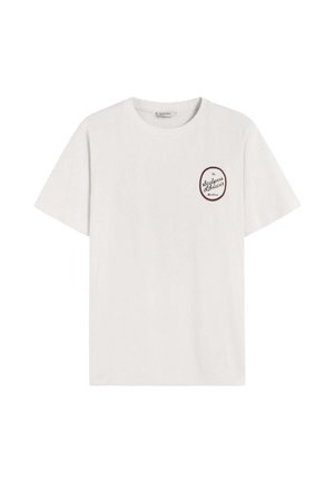 White cotton T-shirt with short sleeves, crew neck, and a circular red and black printed logo on the left chest.