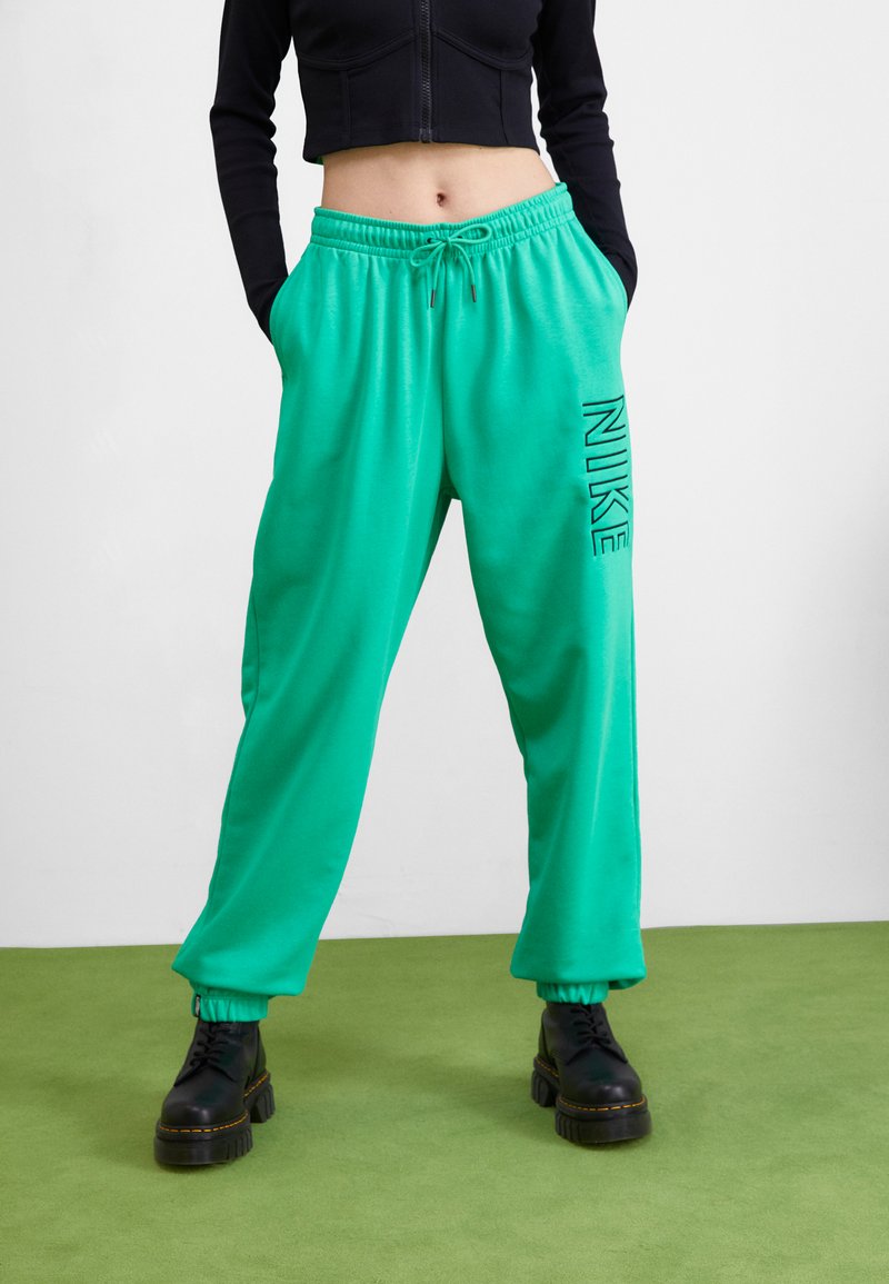 Nike Sportswear Tracksuit bottoms spring green/green Zalando.ie