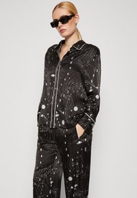 AllSaints SOFI SCREEN TROUSER - Nadrágok - black