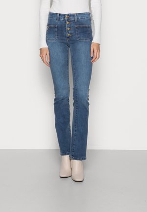 Vaqueros a campana - blue denim