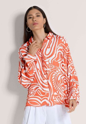 Langärmeliges Hemd mit einem lebendigen orange-weißen Wirbelmuster, hergestellt aus glattem Stoff, mit einer Knopfleiste vorne und einem lässigen Schnitt.