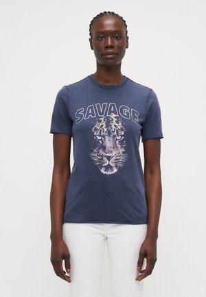Navy cotton t-shirt featuring a large leopard face graphic and the word "SAVAGE" in bold white lettering above. Short sleeves, round neckline.