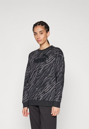 Felpa nera con un motivo a strisce di tigre in grigio e beige. Presenta un colletto rotondo, polsini a costine e un logo nero sul petto.