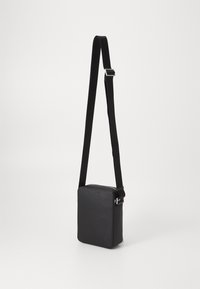 Tommy Hilfiger BUSINESS REPORTER UNISEX - Sac bandoulière - black