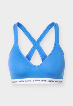 Ανοιχτό μπλε αθλητικό σουτιέν με σταυρωμένους ρυθμιζόμενους ιμάντες στους ώμους και λευκή ελαστική ζώνη με την επιγραφή «BJÖRN BORG» σε απλό φόντο.