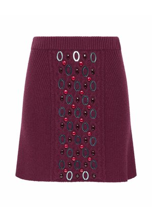 Gonna a maglia color bordeaux con fascia in vita a coste. Presenta decorazioni ovali e circolari in vari colori sul davanti.