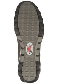 Suela de zapato deportivo marrón con una base de goma gris texturizada que presenta patrones triangulares, acentos negros y un logo central. Talla marcada como 6.