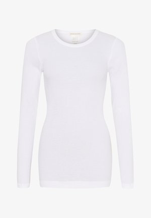 Maglietta bianca a maniche lunghe realizzata in tessuto a coste testurizzato. Presenta un collo rotondo e una silhouette aderente. Design senza cuciture per ridurre l'irritazione.