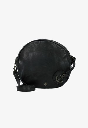 Bolso cruzado de cuero negro con forma redonda, cierre de cremallera y emblema decorativo de ancla. Cuenta con una correa desmontable y textura suave.