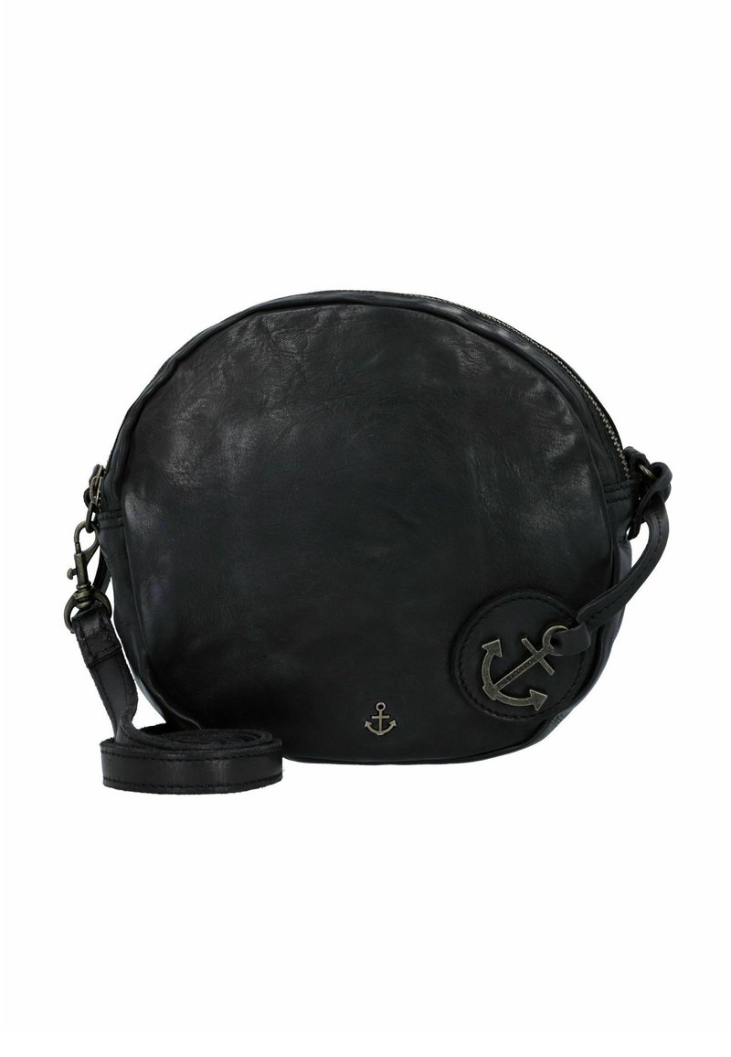 Bolso cruzado de cuero negro con forma redonda, cierre de cremallera y emblema decorativo de ancla. Cuenta con una correa desmontable y textura suave.