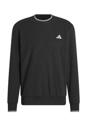 Felpa nera a maniche lunghe con scollatura tonda, polsini a costine e logo Adidas bianco sul petto. Tessuto morbido.