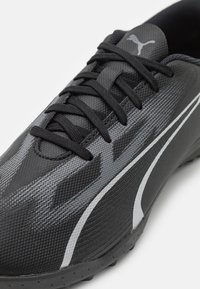 Puma Botines de fútbol para césped - black