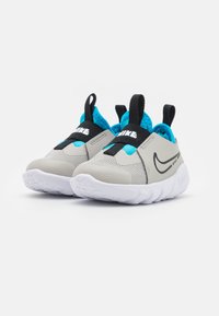 Nike Performance Scarpe da corsa su strada - beige