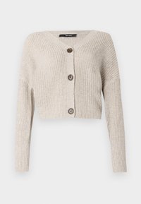 Ljus beige kort cardigan med V-hals, ribbat mönster och två bruna knappar framtill. Har långa ärmar och en lös passform.