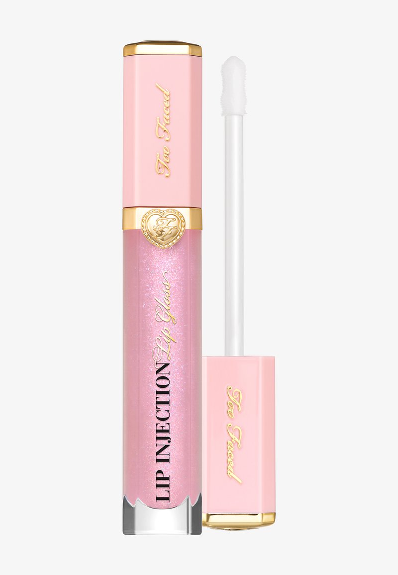 Gloss à lèvres Lip Injection de Too Faced : tube cylindrique rose avec des accents dorés, gloss rose scintillant à l'intérieur et un applicateur blanc.