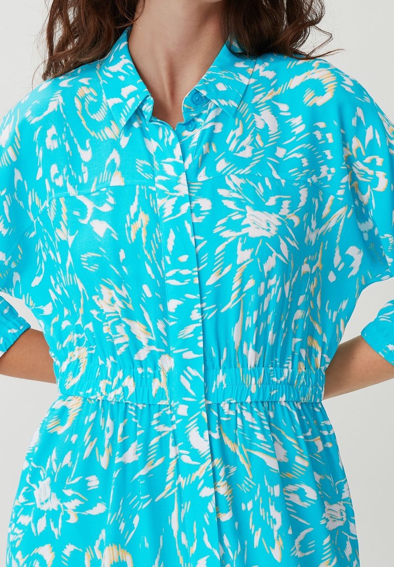 sachin and babi light blue dress Casual Turquoise Dress on Mannequin. Stock Image main image 0