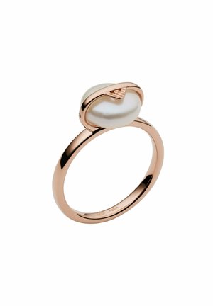 Rose gold ring featuring a smooth, white pearl, shaped with a curved setting. The band is slim and polished, highlighting its minimalist design.