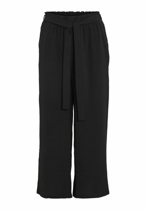 Mustad laiad püksid pehme tekstuuriga, elastne vöökoht ja seotud vöödetail. Omavad lõdva istuvust ja lühendatud pikkust.