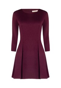 Bordeauxfarbenes Langarmkleid mit Rundhalsausschnitt, tailliertem Oberteil und plissiertem Rock. Hergestellt aus einem glatten, elastischen Stoff. Mit Reißverschluss hinten.