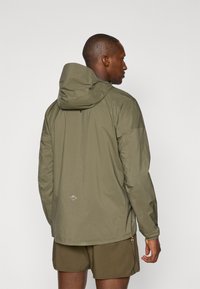 ASICS FUJITRAIL khaki