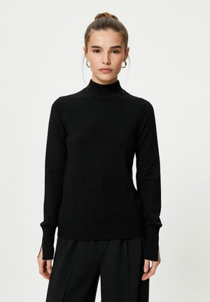 - Sweter