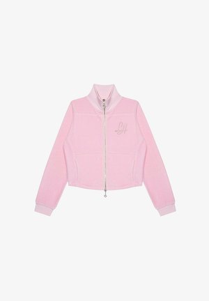 Jasnoróżowa polarowa kurtka z pełnym zamkiem z przodu, stojącym kołnierzem, długimi rękawami, dwoma bocznymi kieszeniami oraz małym logo z kryształkami na klatce piersiowej.