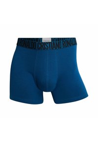 Boxer in blu realizzati in tessuto morbido. Presentano un ampio elastico nero con la scritta "CRISTIANO RONALDO" stampata in lettere in grassetto.