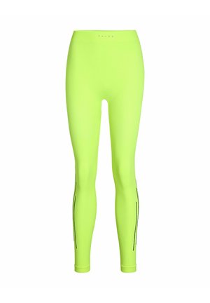 Neongrüne Leggings aus dehnbarem Stoff. Verfügt über einen hohen Bund und schwarze vertikale Nähte entlang der Beine. Glatte Textur.